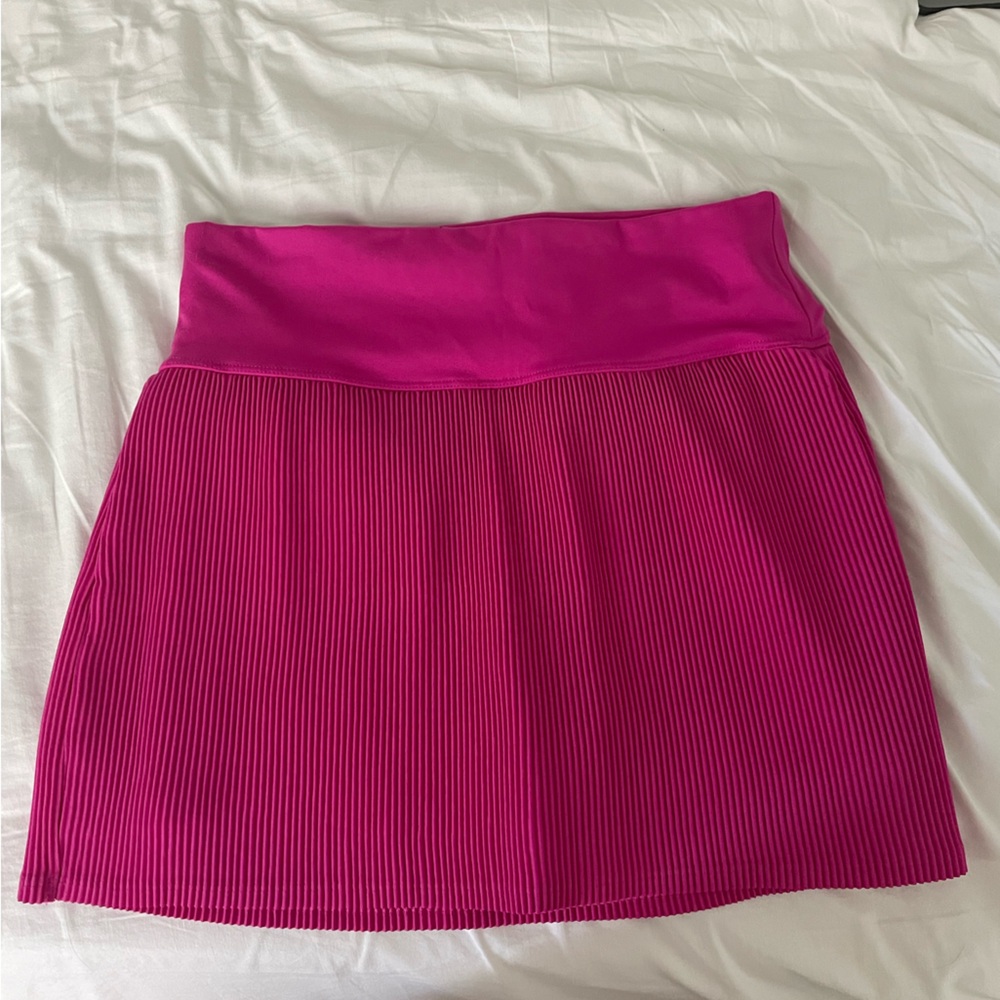 Pink mini tennis skirt